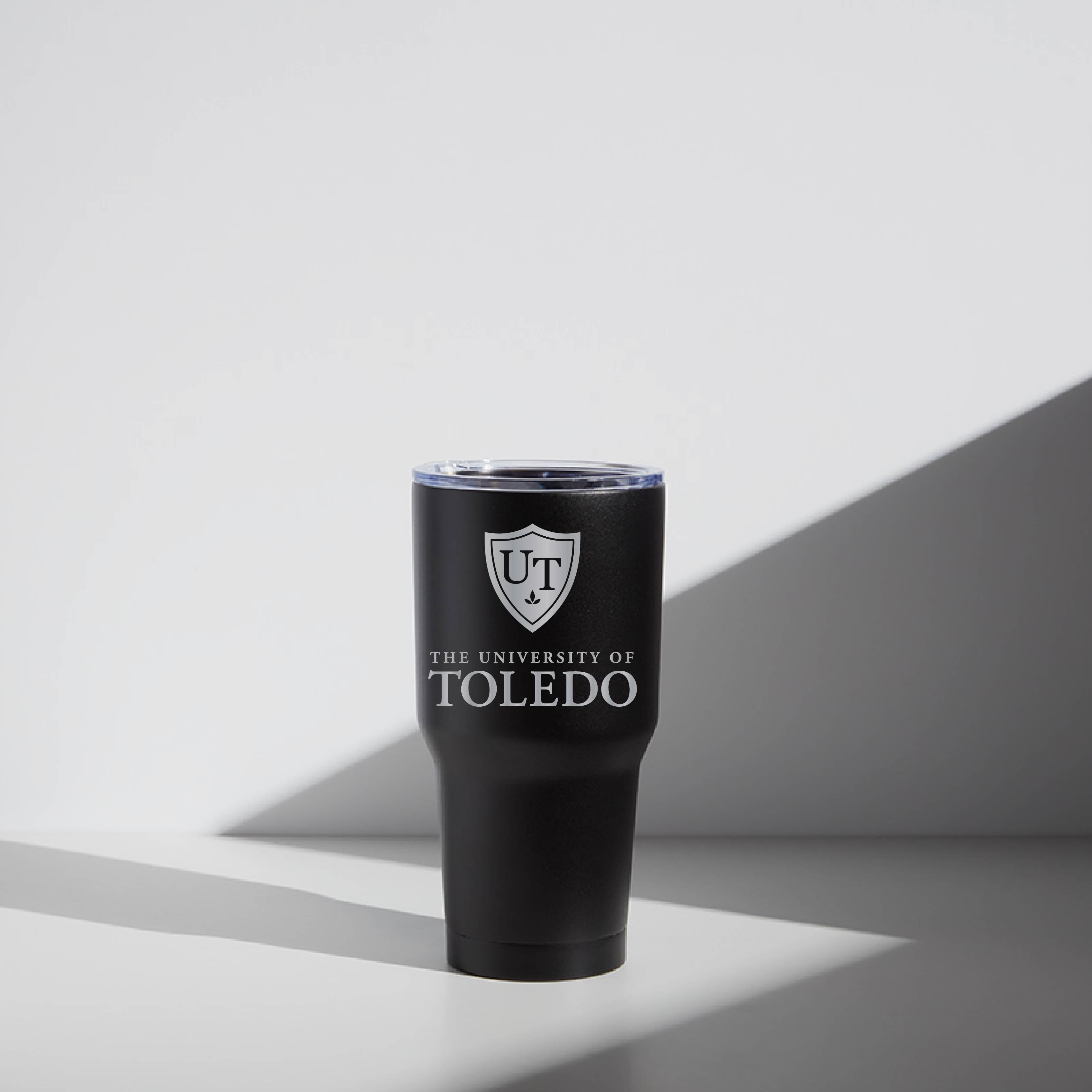 A black 30 oz stainless steel tumbler with a magnetic lid, featuring the University of Toledo logo.