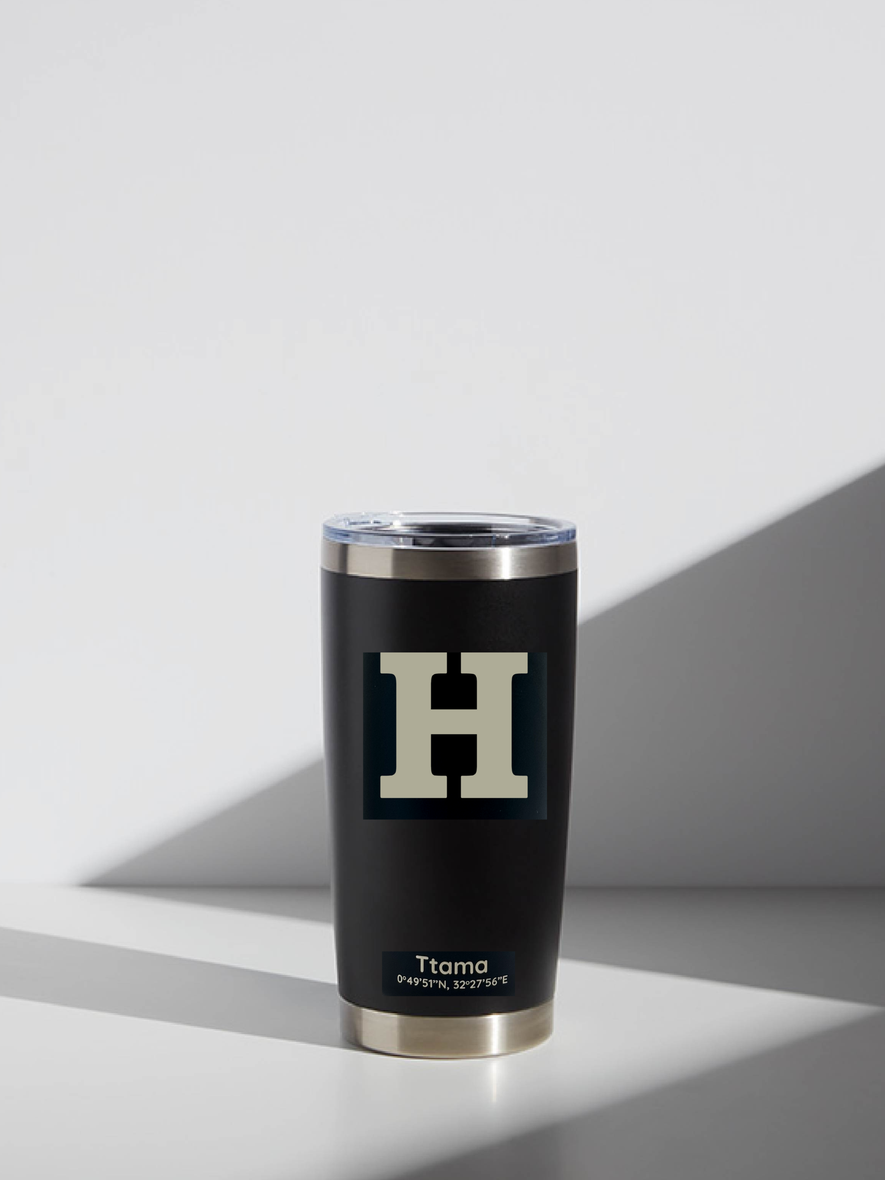 Black tumbler with an etched block 'H' for Medina Highland on a light gray background