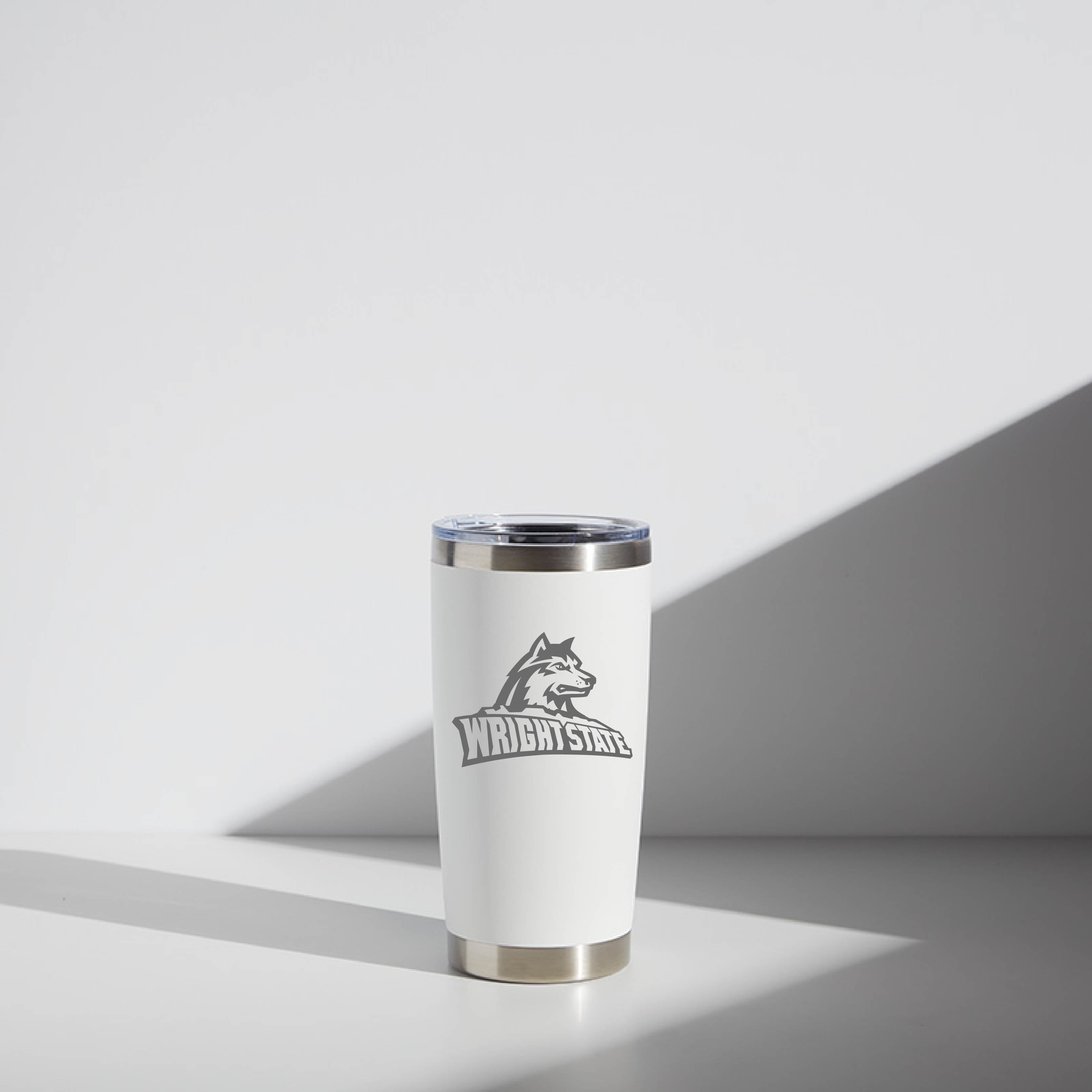 White 20 oz WATR tumbler with the Wright State Raiders logo, featuring a stainless steel rim and shadowed on a light background.